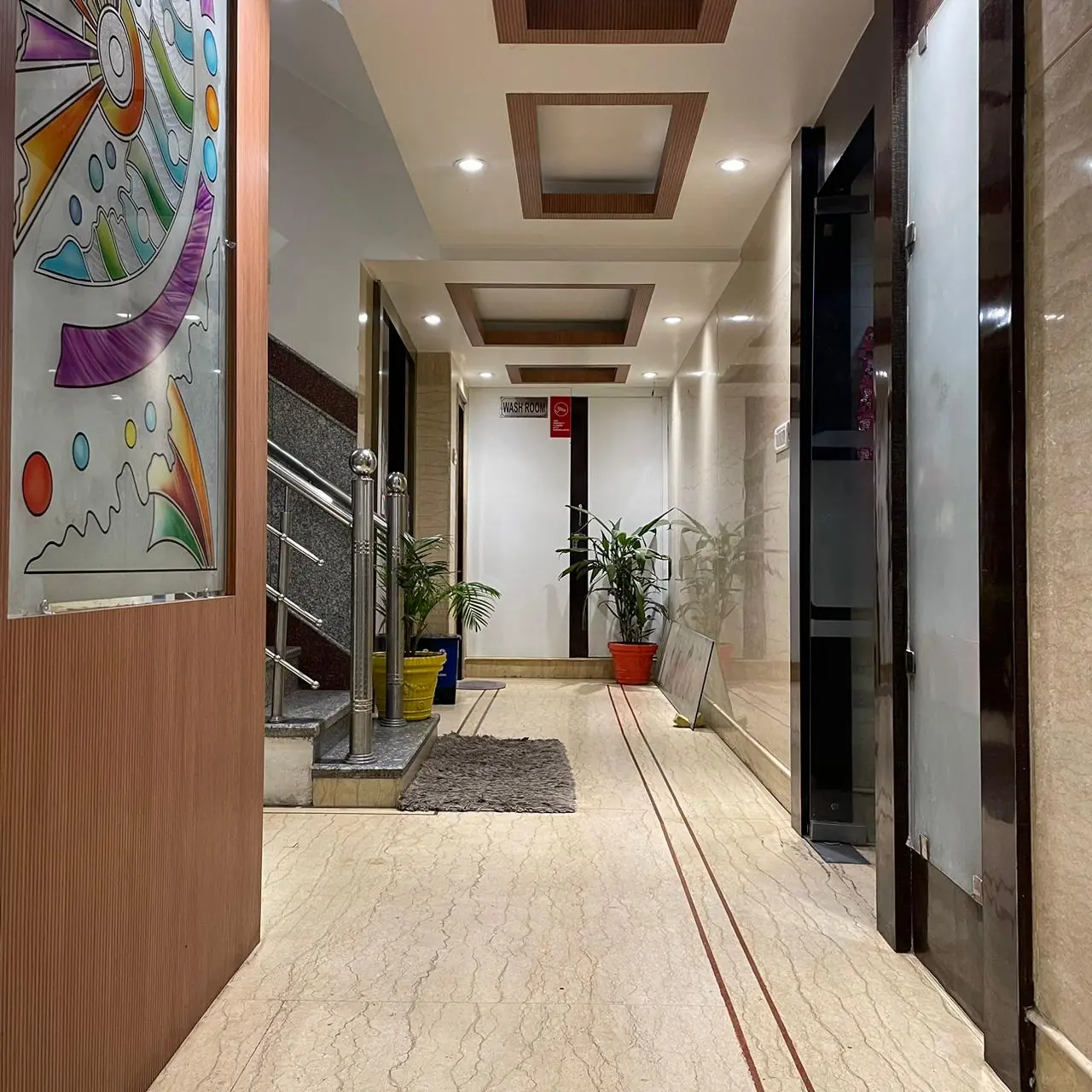 Hotel Galaxy hallway with decorative glass art